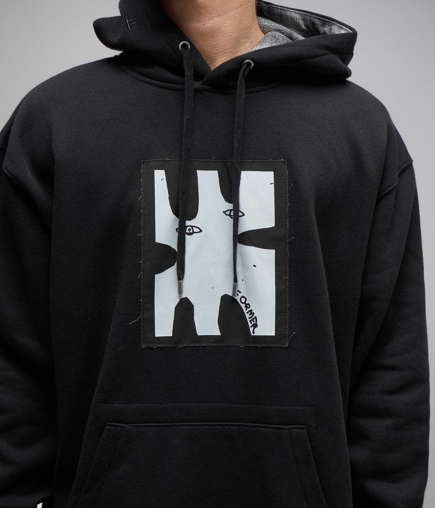 ENIGMA PATCH HOOD // BLACK