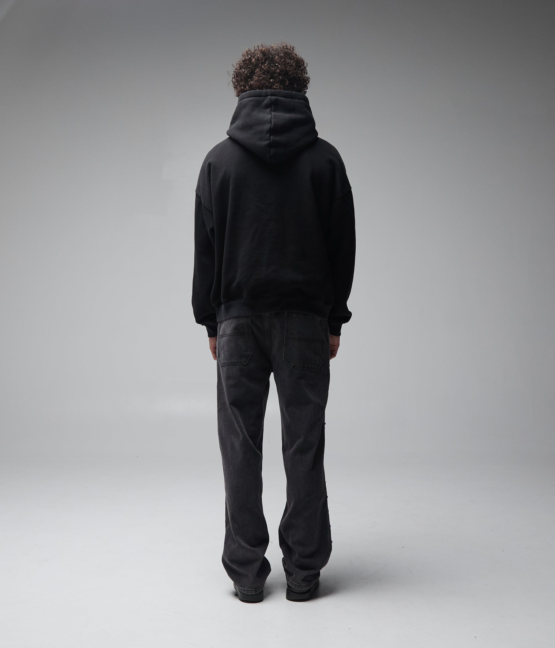 FORMER Skullz Boxy Heavy Hood in Merch Black - FORMER x RAGE Collection