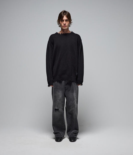 FORMER Future Distressed Knit in Black - The Shiny Bleeding Future Collection