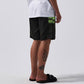 MANNERS 18' SWIM TRUNK  // BLACK/LIME