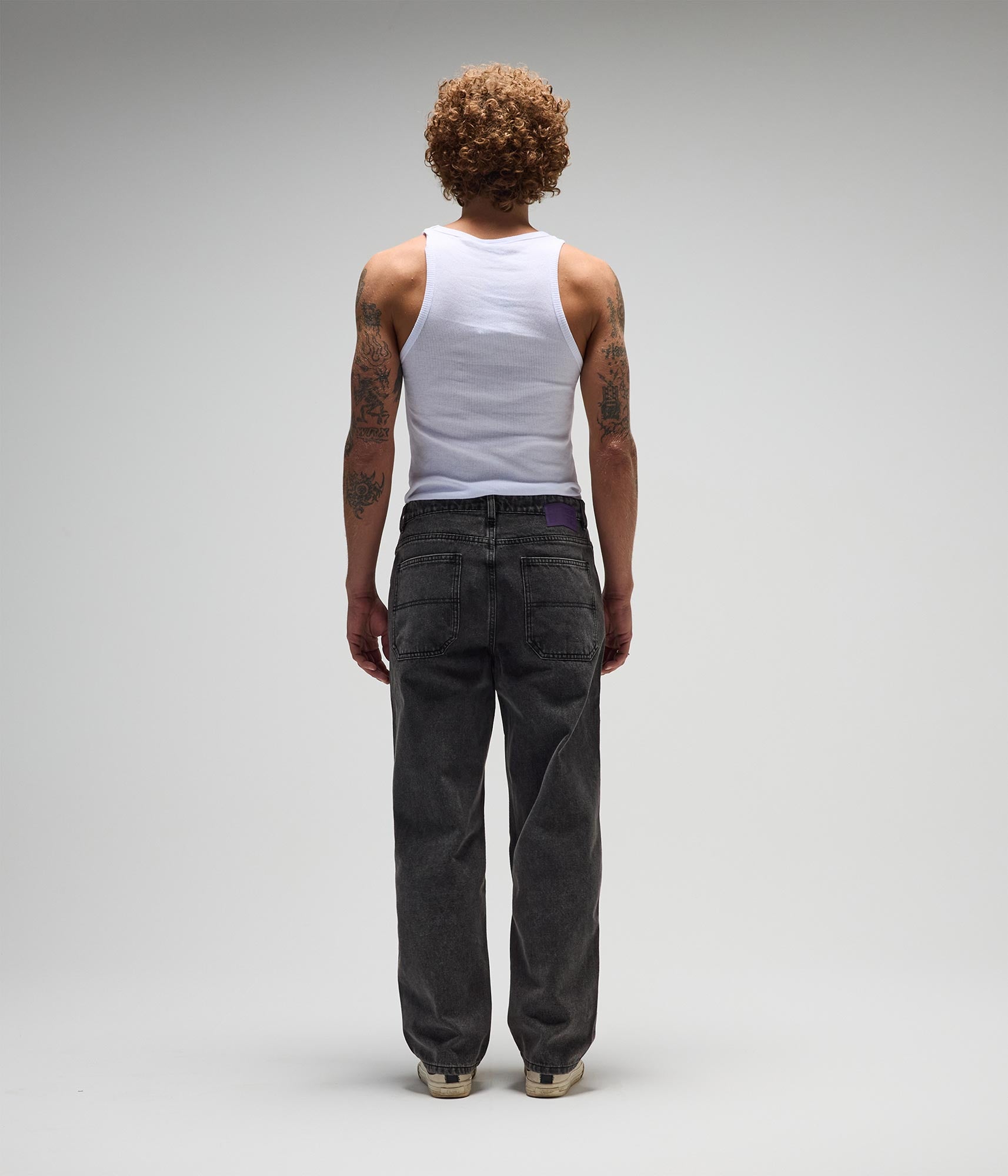 FORMER Studded Denim Pant in Washed Black - FORMER x RAGE Collection