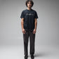 FORMER Nocturne T-Shirt in MERCH BLACK