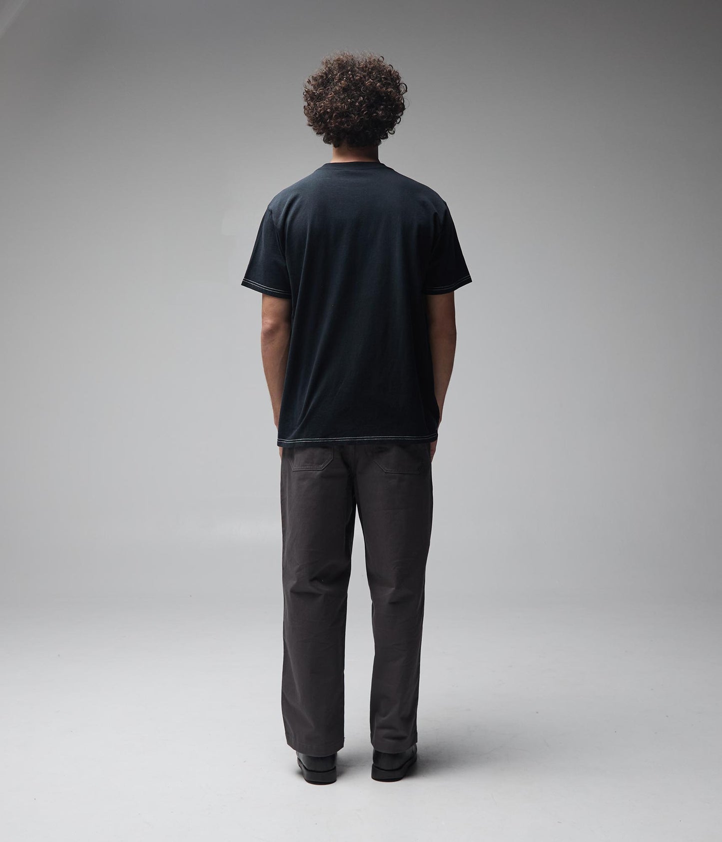 FORMER Nocturne T-Shirt in MERCH BLACK